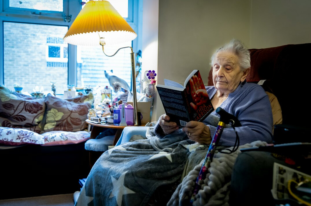 senior woman reading book