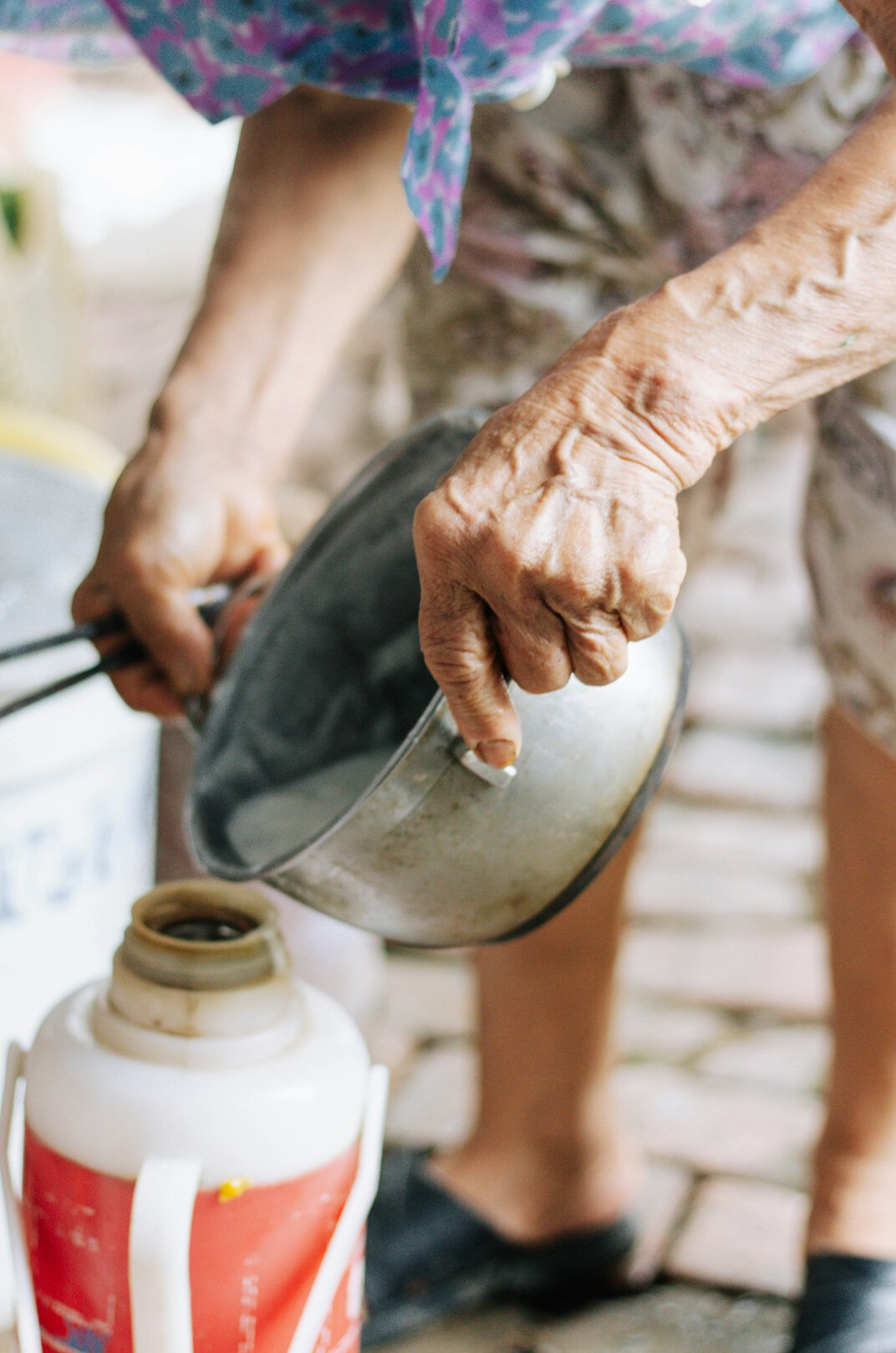 elderly people cooking together